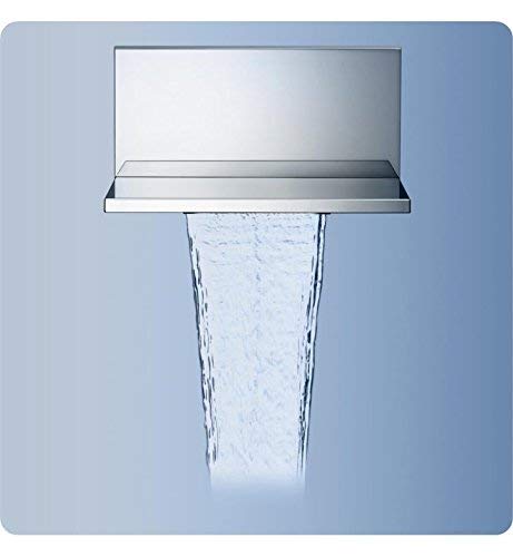 Chrome tub spout trim with rectangular escutcheon plate dispensing water stream against blue background.