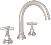 Satin nickel widespread lavatory faucet with curved C-spout and cross handles on round bases.