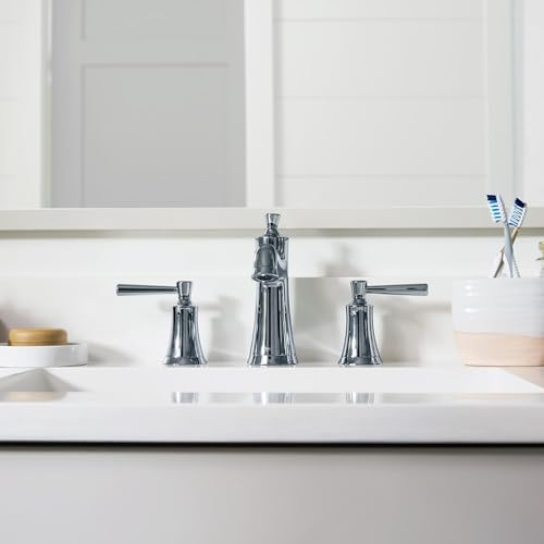 Chrome widespread bathroom faucet with tall center spout and dual lever handles on white sink.