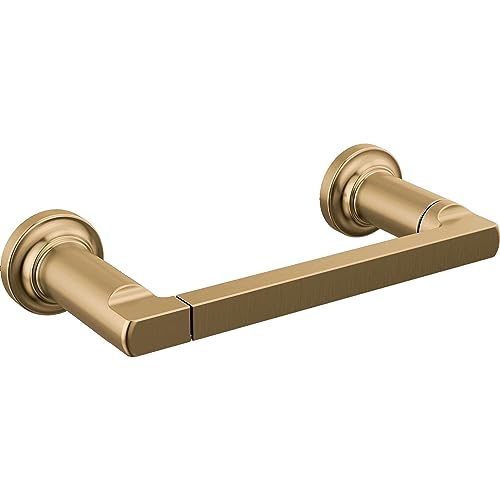 Champagne bronze toilet paper holder with cylindrical end caps and rectangular bar mounted horizontally.