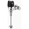 Polished chrome commercial toilet flush valve with black actuator and metal mounting components.