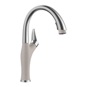 Pull-down kitchen faucet with concrete gray handle and stainless steel curved spout.