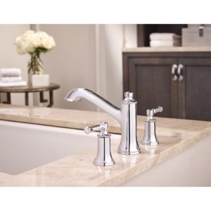 Chrome two-handle high arc roman tub faucet with curved spout and lever handles on marble countertop.