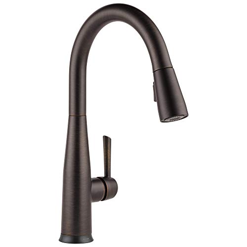 Black matte single-handle kitchen faucet with curved spout and pull-down spray head.