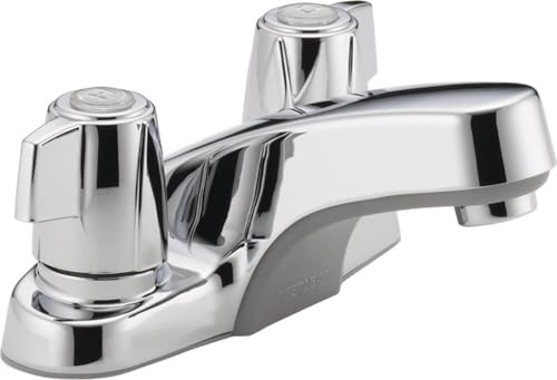 Chrome two-handle bathroom faucet with curved spout and circular knob handles.
