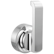 Chrome floor-mount tub filler with tall rectangular body and circular lever handle on rounded base.