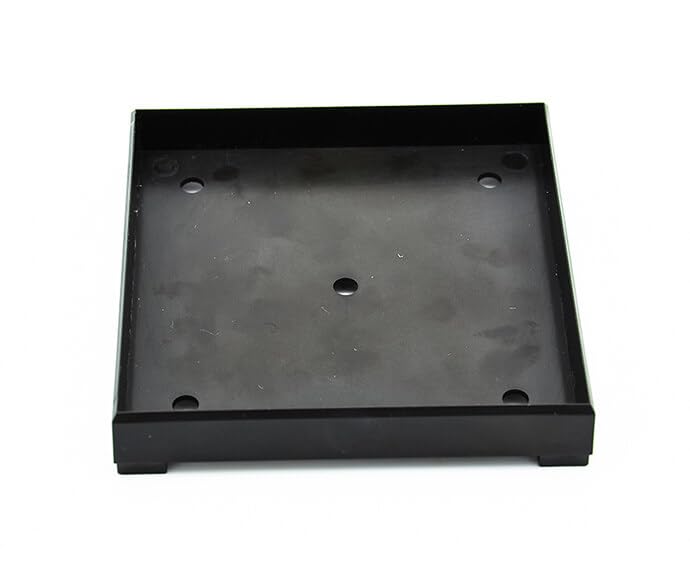 Black square tile-in shower drain base with center drain opening and mounting holes.