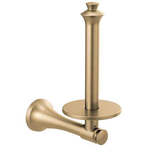 Champagne bronze vertical tissue holder with cylindrical post and round base, featuring matching paper roll dispenser arm.