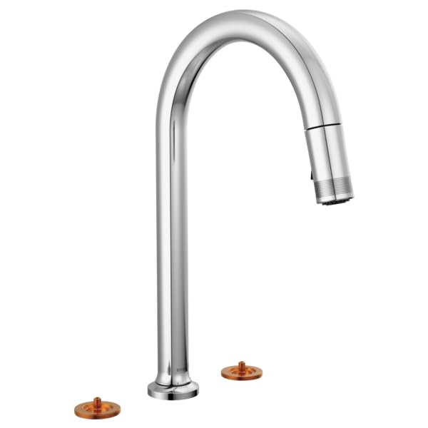 Chrome widespread faucet with tall arc spout, pull-down sprayer head, and two copper-colored base mounts.