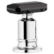 Black crystal knob handle mounted on chrome cylindrical base with hexagonal black top piece for roman tub faucet.