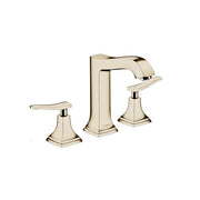 Polished nickel three-piece widespread faucet with angular spout, lever handles, and tapered base pedestals.