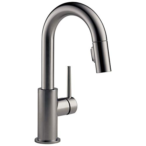 Chrome pull-down kitchen faucet with single handle and curved spout.