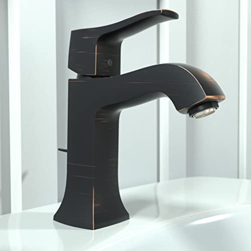 Rubbed bronze single-hole bathroom faucet with angular spout and lever handle on white sink basin.