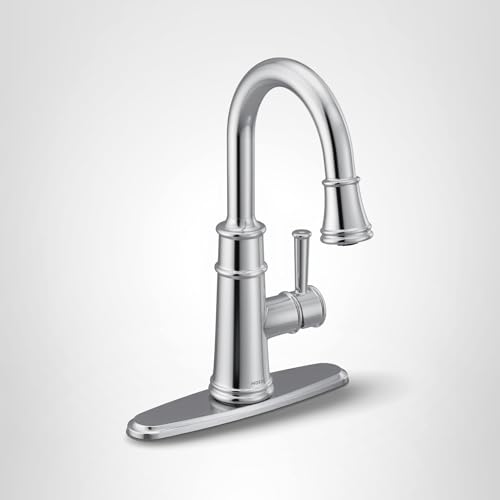 Chrome kitchen faucet with tall curved spout, single side handle, and pulldown spray head on base plate.