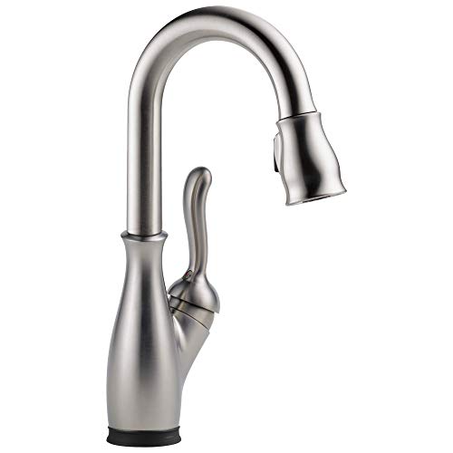 Chrome single-handle pull-down kitchen faucet with curved spout and lever control.