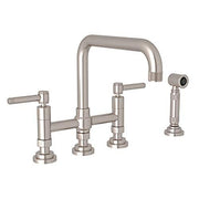Satin nickel bridge kitchen faucet with high curved spout, dual handles, and detached side spray.
