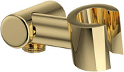 Unlacquered brass handshower outlet with cylindrical holder and wall-mounted connector featuring polished gold finish.