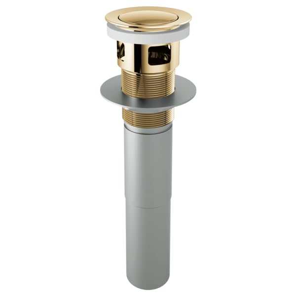 Polished gold push button pop-up drain assembly with overflow and gray pipe body.