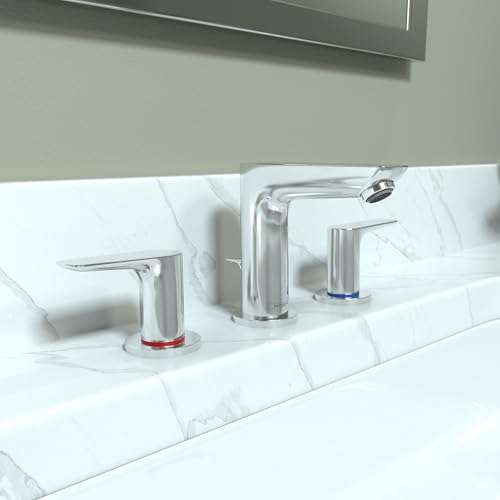 Chrome widespread bathroom faucet with two handles and showerhead spout mounted on white marble countertop.