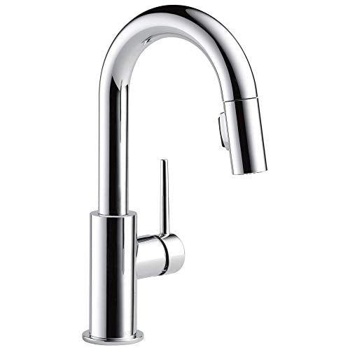 Chrome single-handle kitchen faucet with pull-down sprayer and curved spout.