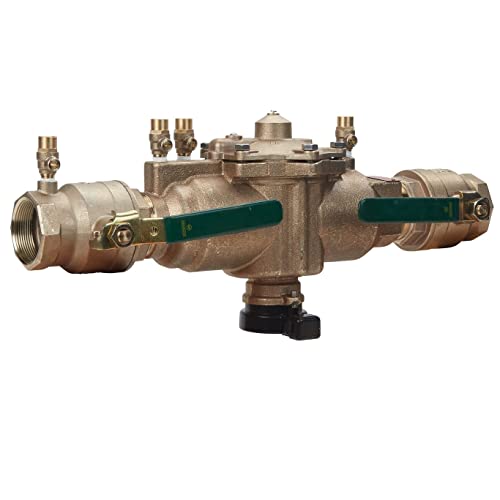 Brass backflow preventer with two green shut-off handles, inlet and outlet ports, and test cocks on top.