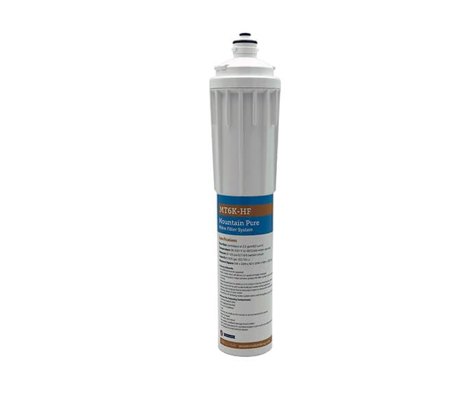 White cylindrical water filter cartridge with blue label and black top cap for Mountain Plumbing MT6K-HF model.