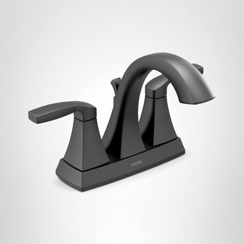 Matte black two-handle centerset bathroom faucet with curved spout and rectangular handles on square base.