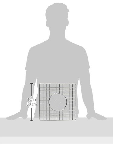 Stainless steel wire grid with circular drain hole, approximately 12 inches tall, for kitchen sink insert.