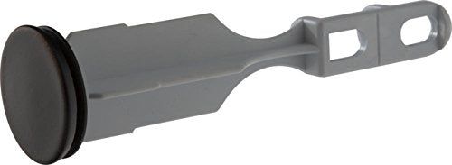 Venetian bronze drain stopper with gray plastic body and circular dark metal cap, mounting hardware visible on right end.