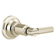 Polished nickel lever handle volume control trim with circular escutcheon plate and cylindrical body.