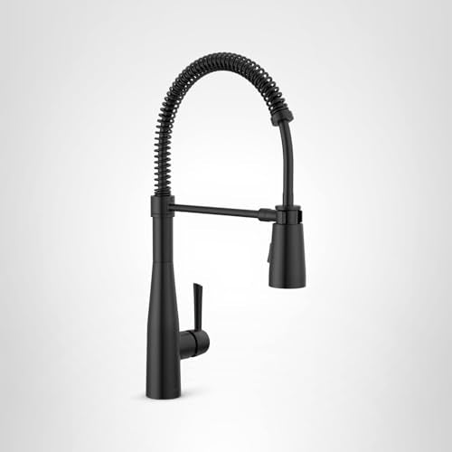 Matte black single-handle pull-down kitchen faucet with flexible coiled hose and side spray attachment.