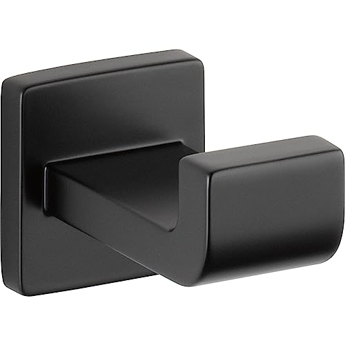 Matte black robe hook with cylindrical handle mounted on square backplate.