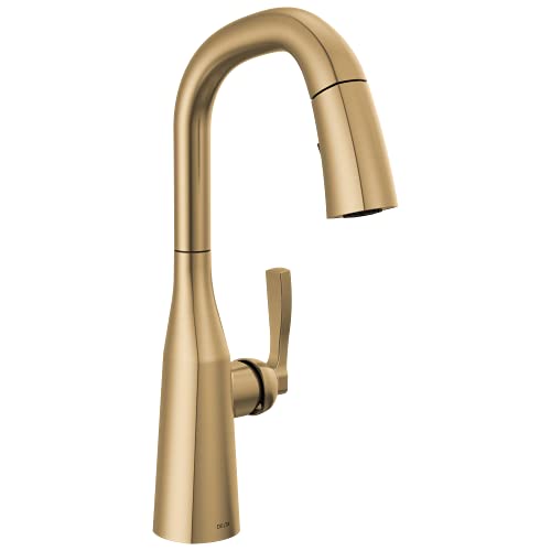Champagne bronze single-handle pull-down kitchen faucet with curved spout and lever control.