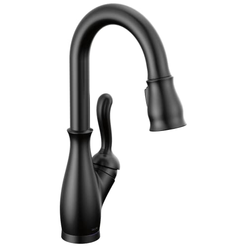 Black single-handle pull-down kitchen faucet with curved spout and ergonomic side lever.