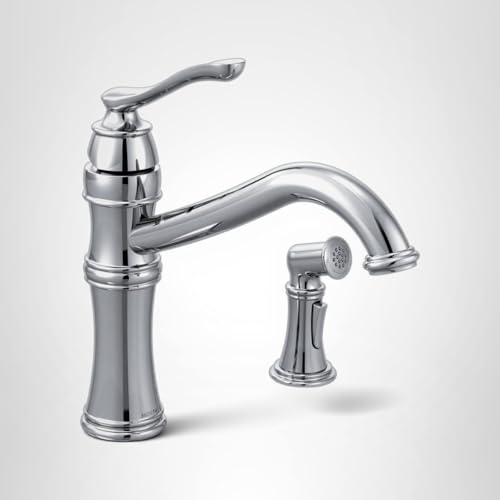 Chrome kitchen faucet with high arc spout, single handle, and separate side spray attachment.