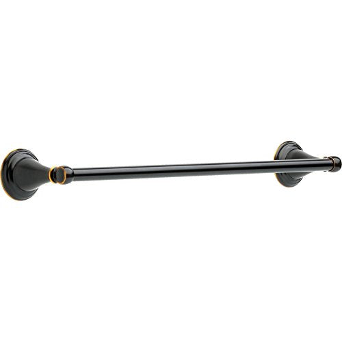 Chrome towel bar with oil-rubbed bronze circular wall mounts and gold-tone accents.