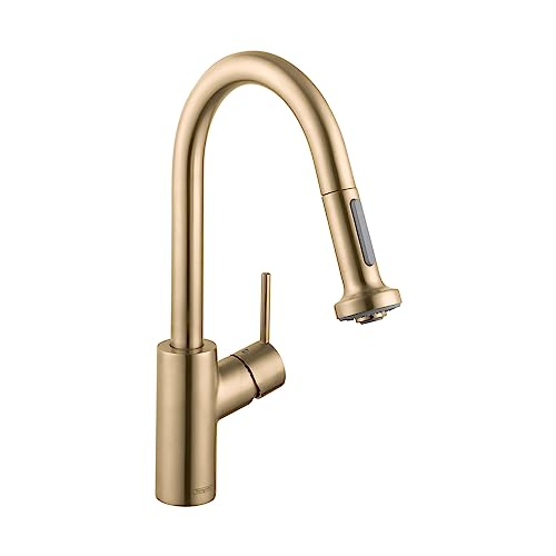 Brushed gold kitchen faucet with curved pull-down spout and single lever handle.