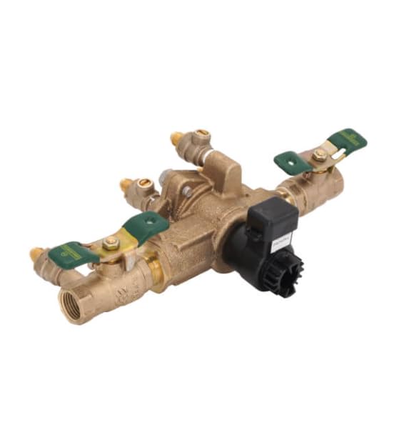 Brass backflow preventer with green shut-off handles, black flood sensor solenoid, and inlet/outlet ports on white background