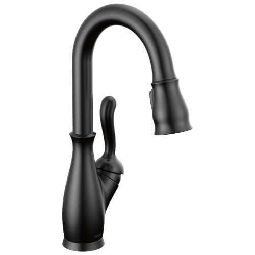 Black pull-down kitchen faucet with curved spout and single lever handle.
