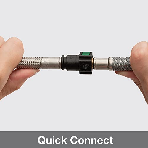 Stainless steel faucet connector with braided hoses and black quick-connect coupling held in hands.