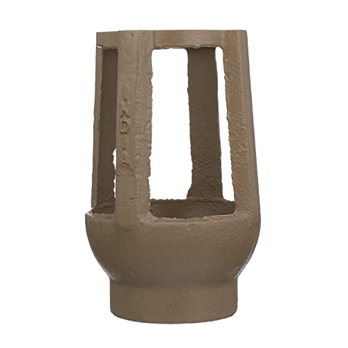 Tan plastic air gap component with cylindrical base and rectangular opening, designed for backflow preventer assembly.