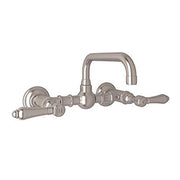 Wall-mount bridge lavatory faucet with U-shaped spout and lever handles in satin nickel finish.