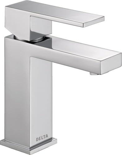 Chrome single-handle bathroom faucet with square spout and tall rectangular base.