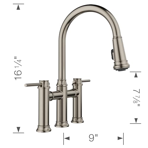 Satin platinum bridge faucet with two side handles and pull-down sprayer head, 16 1/4 inches tall.