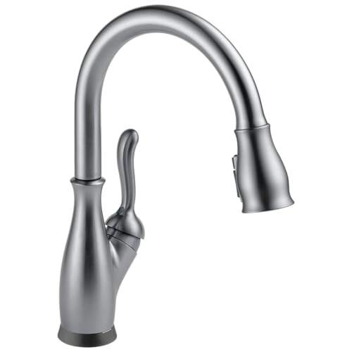 Stainless steel kitchen faucet with high curved spout, pull-down spray head, and single lever handle.
