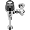 Polished chrome automatic flush valve with sensor housing and mounted bracket for toilet installation.