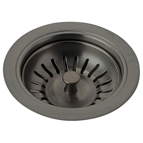 Chrome kitchen sink strainer with wide flange rim and center post with radiating drainage slots.
