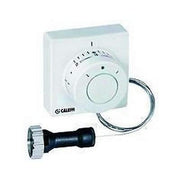 White wall-mounted thermostat with dial control, remote sensor probe with coiled cable, and adjustable knob attachment.