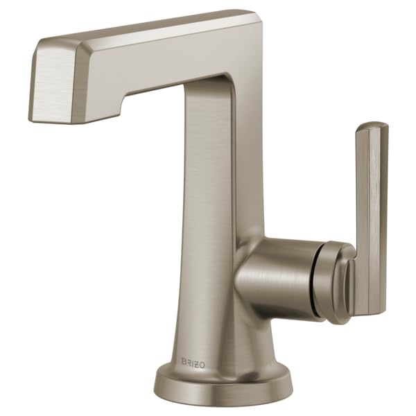 Brushed nickel single-handle bathroom faucet with tall spout and cylindrical lever handle on round base.