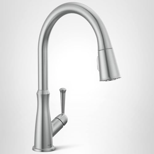 Stainless steel pull-down kitchen faucet with curved spout and single handle control lever.